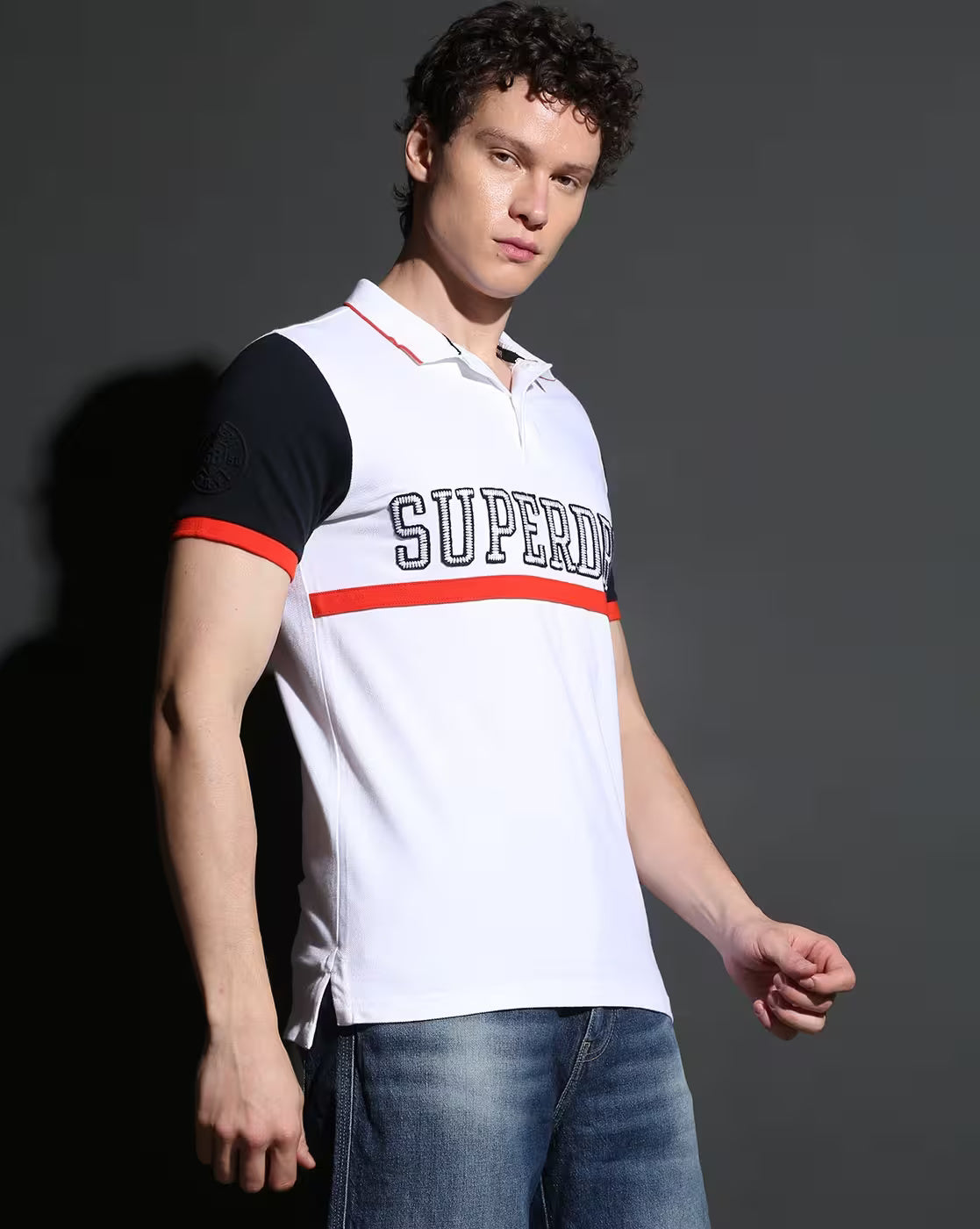 Superdry Premium Pique Polo in Crisp White with Bold Navy and Fiery Red Accents