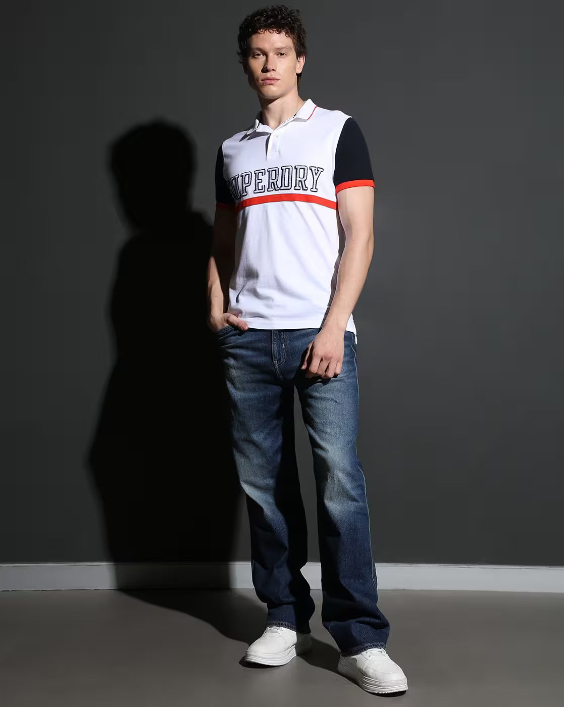 Superdry Premium Pique Polo in Crisp White with Bold Navy and Fiery Red Accents